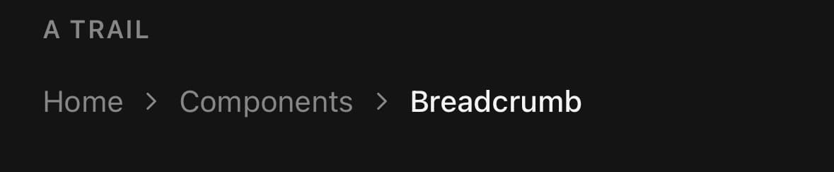 A three-step trail reading Home, Components, Breadcrumb, separated by chevrons. The first two are muted links; the last is white and unlinked, because it is the page you are already on.